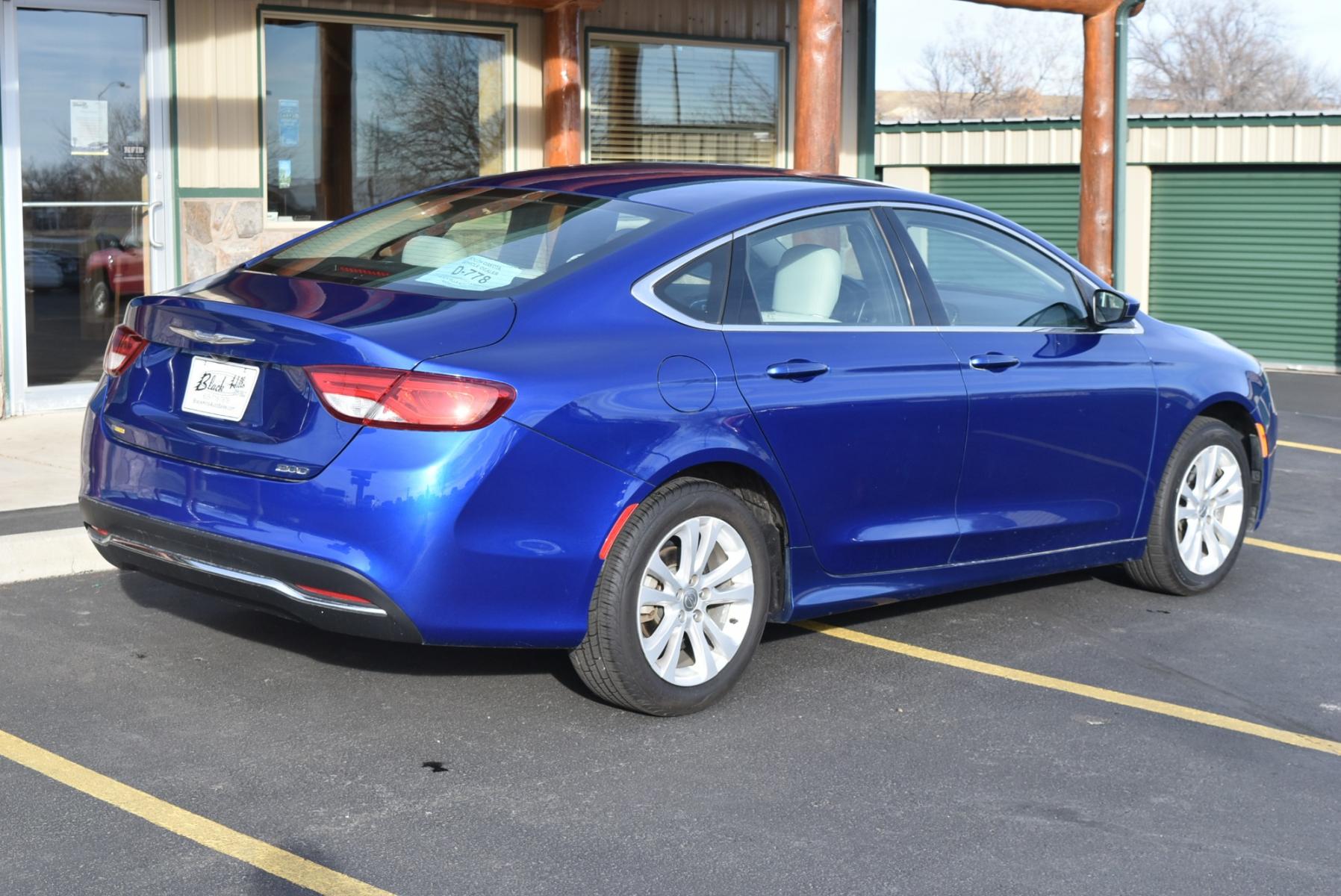 2016 Blue /Beige Chrysler 200 Limited (1C3CCCABXGN) with an 2.4L 4 Cyl Multiair engine, 9-Speed Automatic transmission, located at 1600 E Hwy 44, Rapid City, SD, 57703, (605) 716-7878, 44.070232, -103.171410 - Photo #7